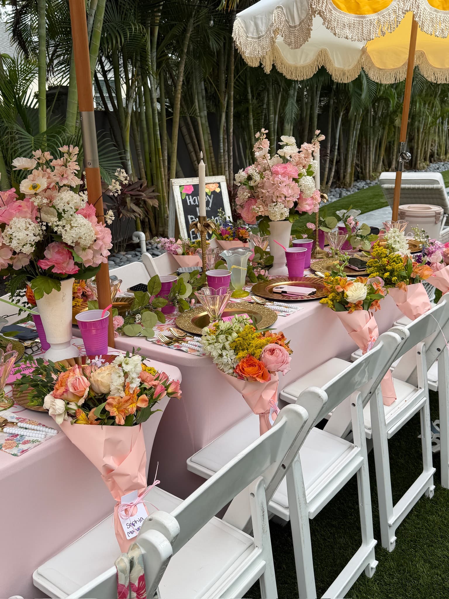 Guests composing blooms at a Flor + Palma event